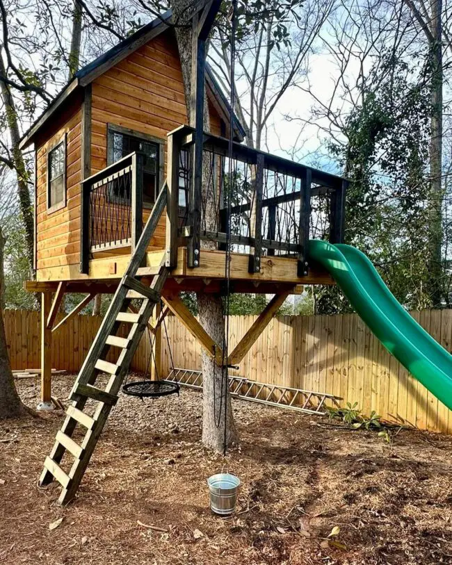 Cozy Treehouse with Ladder and Slide Access