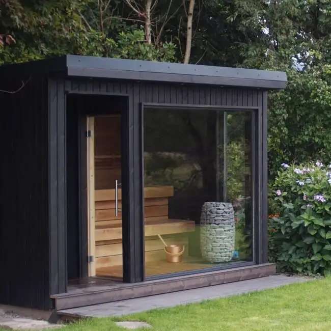 Modern Sauna with Lush Garden View