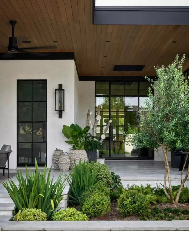 Contemporary Front Porch with Wood-Planked Ceiling