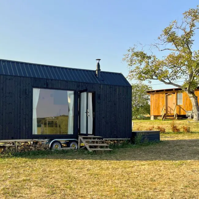 Cozy Black Tiny Home with Rustic Vibes