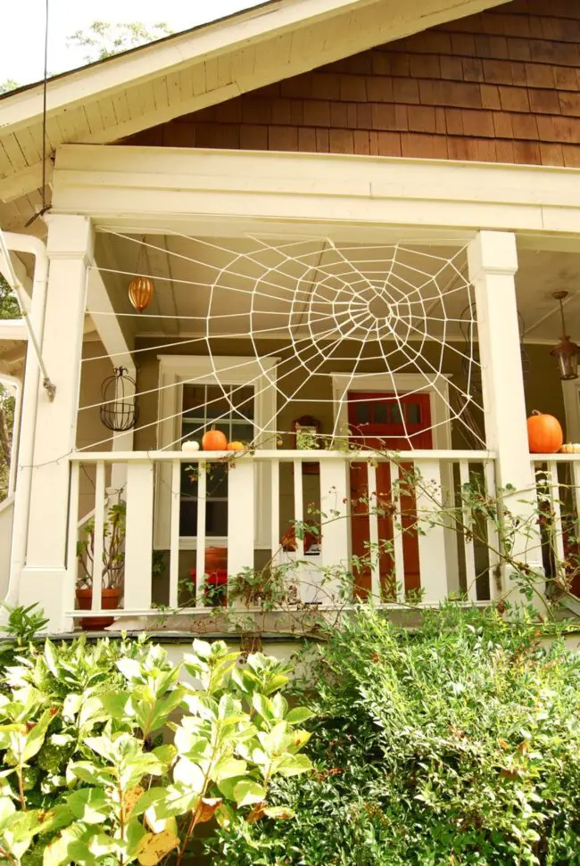 Webbed Porch with Jack-O’-Lanterns