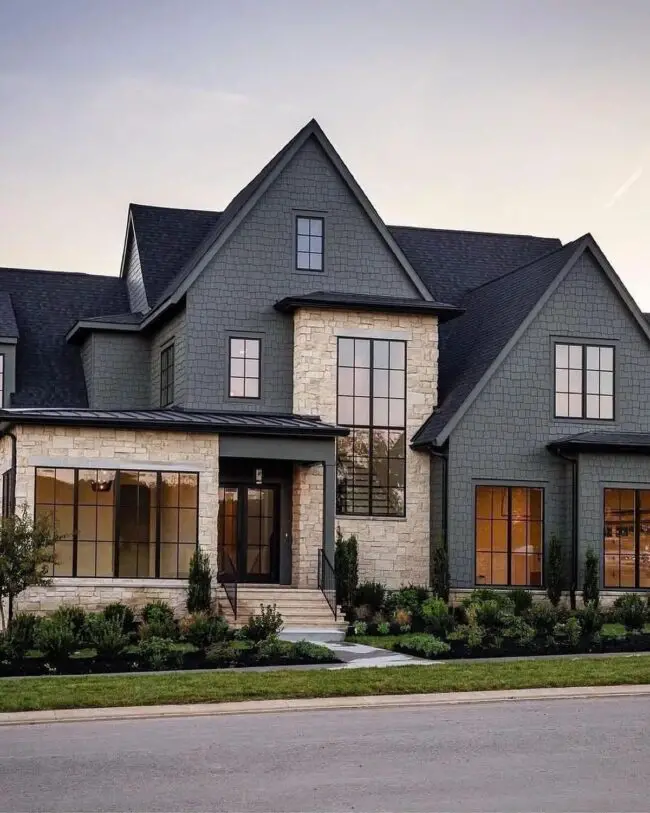 Sophisticated Stone Exterior with Dark Shingles