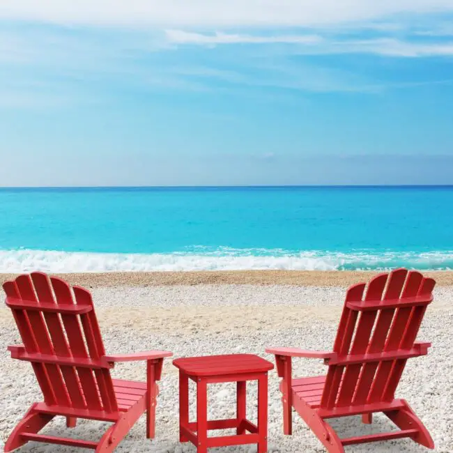 Crimson Adirondack Chairs on the Beach