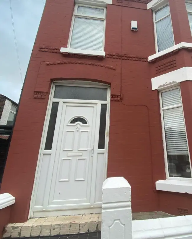 Crisp White Door to Complement Red Brick