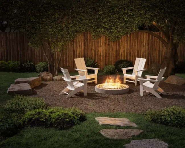 White Adirondack Chairs in a Rustic Setting