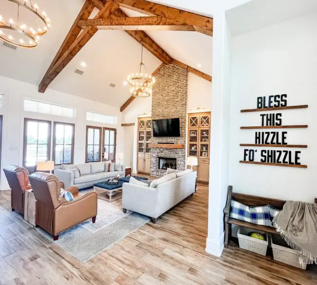 Grand Living Room with Exposed Beams in Farmhouse Style