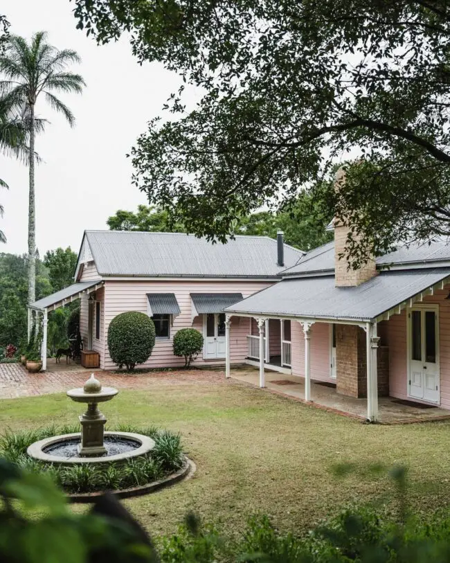 Pastel Pink Cottage with Expansive Design