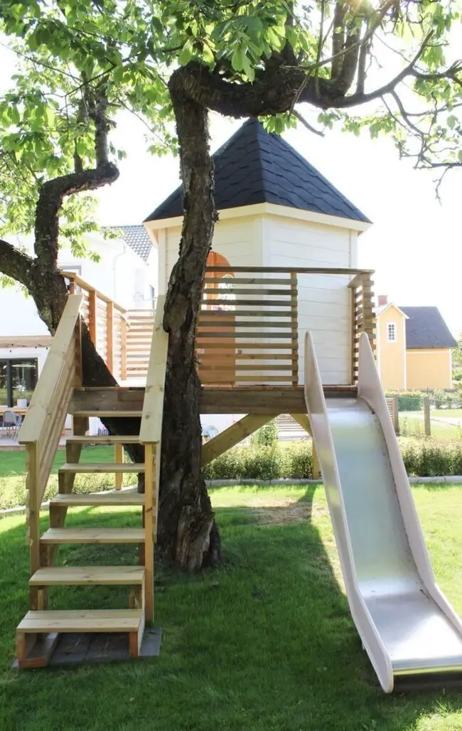 Elevated Playhouse with Slide for Fun and Function