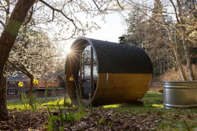 Springtime Blossom Surrounded Rustic Barrel Sauna