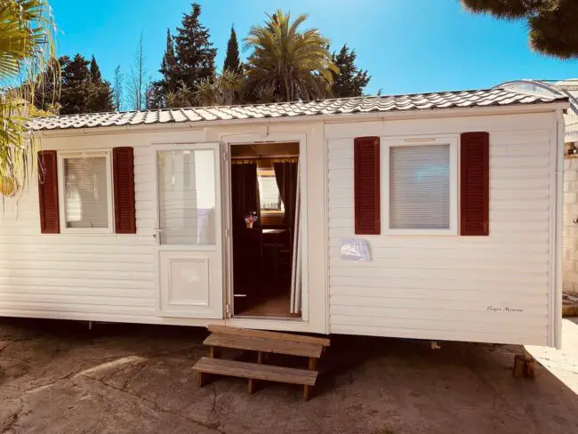 Bright, Simple Exterior with Classic Shutters