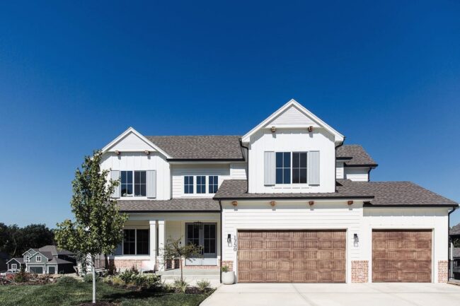 White House with Wood Garage and Brick