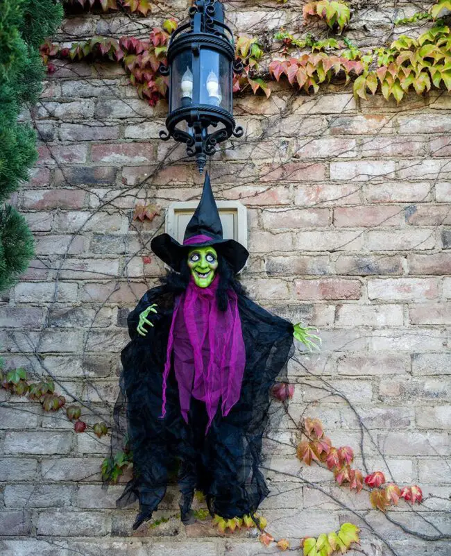 Hanging Witch with an Ominous Green Face