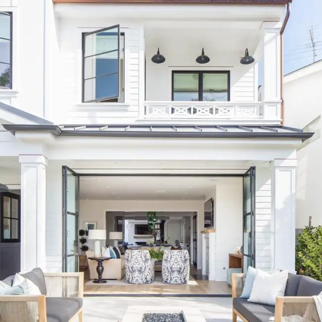 Open-Concept White House with Large Windows